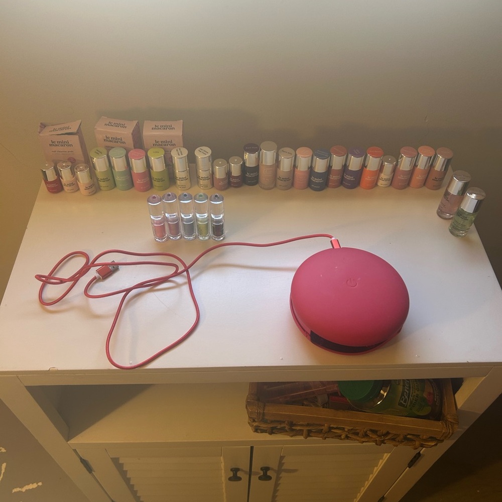 Pink Nail Polish Dryer with Assorted Polishes